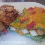 Chicken Enchiladas and refried beans with Tyson Chicken Fries